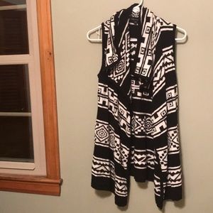 Knit black and white sleeveless cardigan